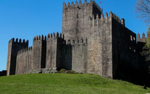 Explore the historic Guimarães Castle, a stunning example of medieval architecture in Portugal.